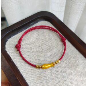 Vòng tay chỉ đỏ rượu vang mix cá vàng kim sa không gỉ
